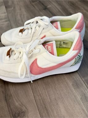 Nike Women’s White Canvas Sneakers with Pink Swoosh